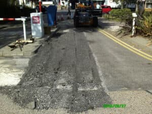 Carpark resurfacing in progress at a commercial yard